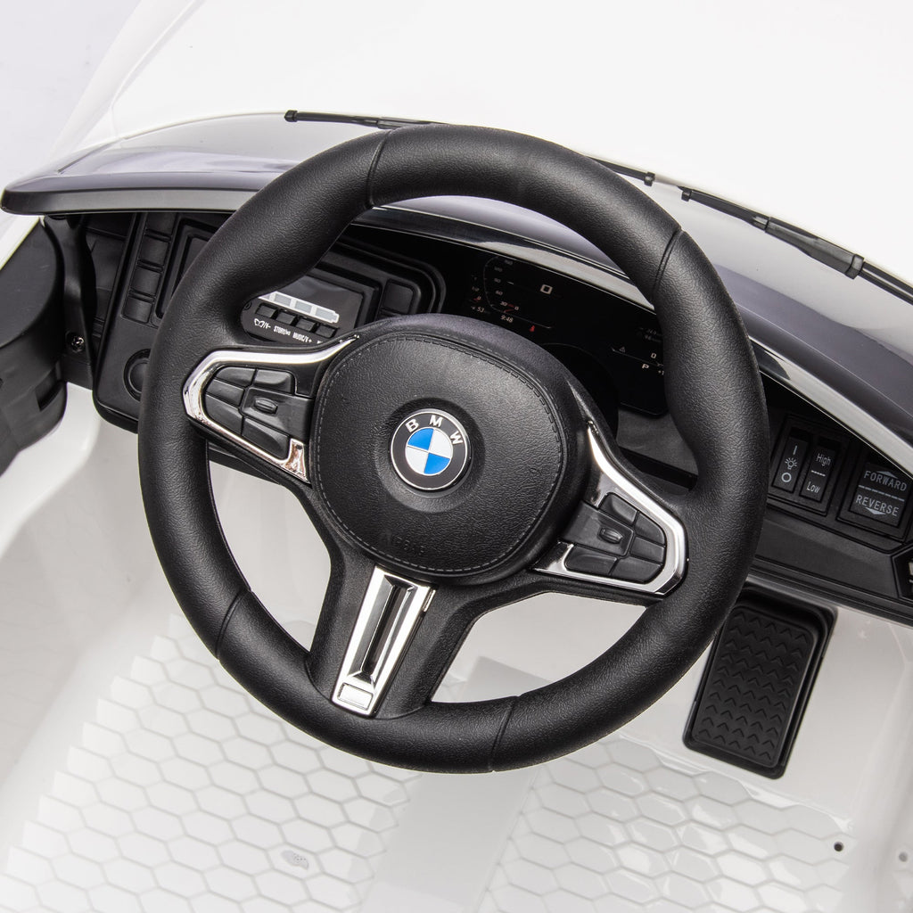 BMW M4 12v Kids ride on toy car 2.4G W/Parents Remote Control,Three speed adjustable,Power display, USB,MP3 ,Bluetooth,LED light,story,A handle with wheels and a pull, easy to carry